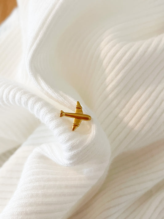 Piercing d’oreille Avion